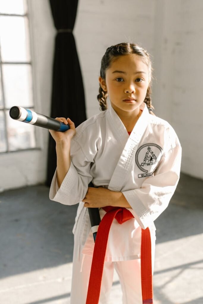 A Girl Wearing Taekwondo Uniform